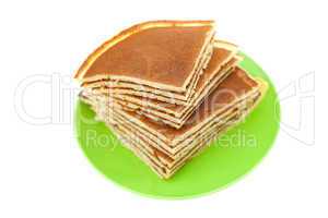 Pancakes on a plate isolated on white
