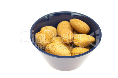 almonds in a bowl isolated on white