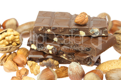 chocolate bar and nuts  isolated on white