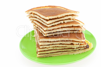 Pancakes on a plate isolated on white