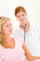 Medical doctor stethoscope examine woman patient