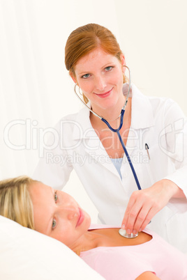 Medical doctor stethoscope examine woman patient