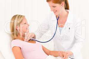 Medical doctor stethoscope examine woman patient