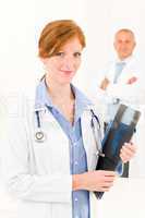 Medical doctor team young female hold x-ray