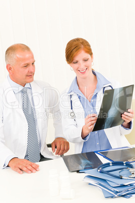 Medical doctor team look point at x-ray Medical doctor team look point at x-ray