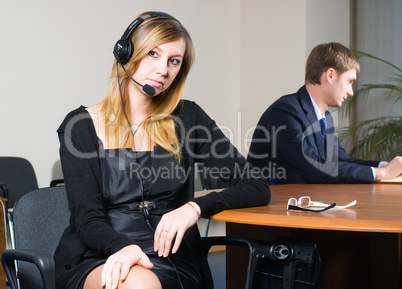 Beautiful business woman with headset