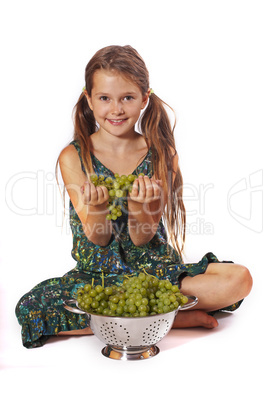 Mädchen mit Weintrauben