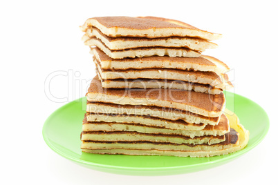 Pancakes on a plate isolated on white