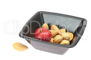 almonds in a bowl and apples isolated on white