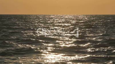 4 IN 1 Waving sea hitting coastline at the sunset