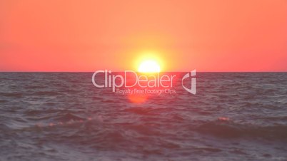 Sunset over the rippling sea