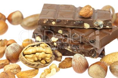 chocolate bar and nuts  isolated on white