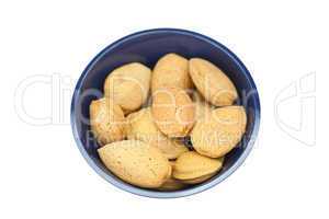 almonds in a bowl isolated on white