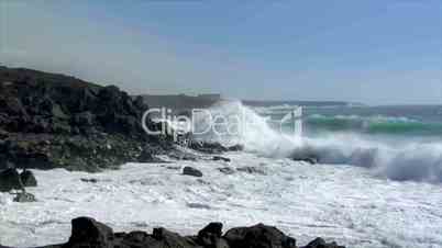 extreme wave crushing coastline wide