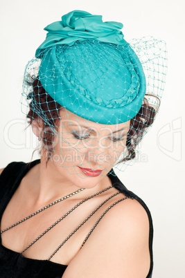 woman in green hat