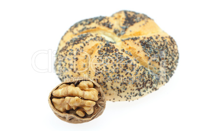 loaf with poppy seeds and walnuts  isolated on white