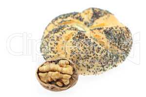 loaf with poppy seeds and walnuts  isolated on white