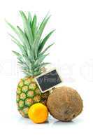 pineapple, mandarin , coconut and board isolated on white