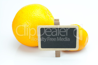 orange, mandarin and board isolated on white