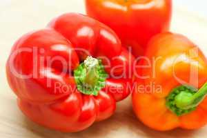 red pepper on a cutting board isolated on white