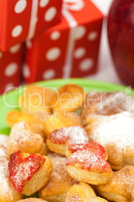 plate of cookies, gifts and apples isolated on white