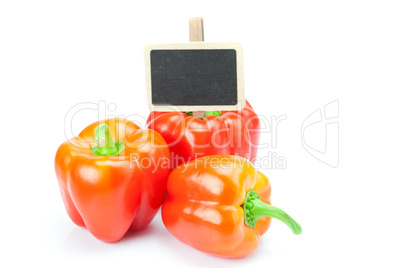 red pepper and board isolated on white