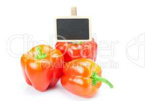 red pepper and board isolated on white