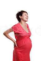 Pregnant young woman in a red shirt