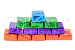 candies in shiny wrappers isolated on white