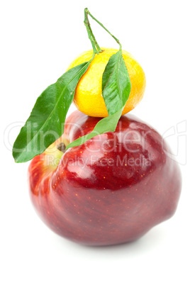 mandarin  and an apple with green leaf isolated on white