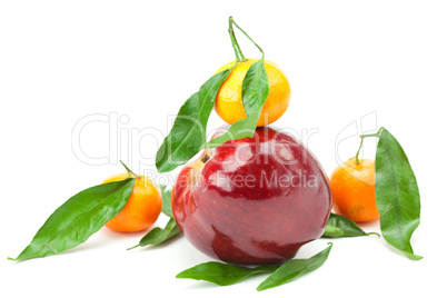 mandarin  and an apple with green leaf isolated on white