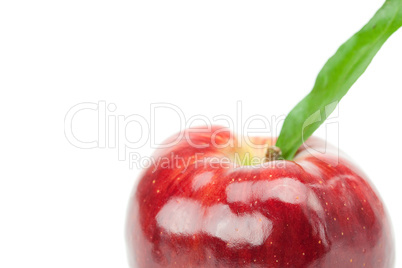 red apple with green leaf isolated on white