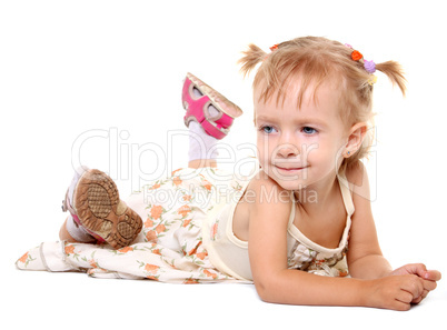 Little girl lying on her stomach