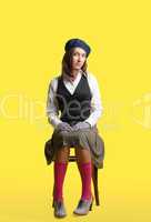 Girl as artist retro style cloth sit on yellow
