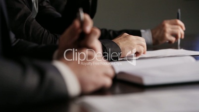 Men's hands on the table. business discussion