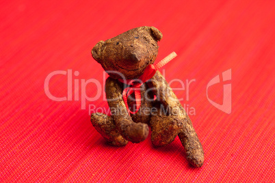 Teddy bear  handmade on a red background