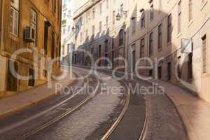 Street with tramway rails in Lisbon, Portugal