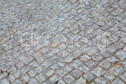 "Calcada", typical portuguese sidewalk, made of small stones