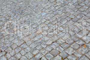 "Calcada", typical portuguese sidewalk, made of small stones