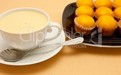 Closeup of coffee with milk in white cup