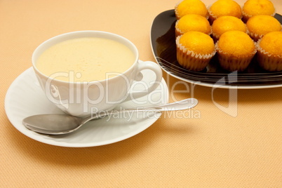 Closeup of coffee with milk in white cup