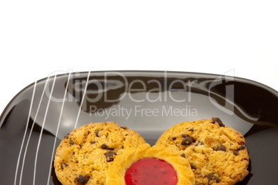 cookies on plate isolated on white backgrounds cookies on plate isolated on white backgrounds
