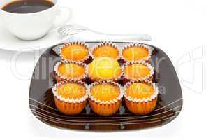 cakes on a plate , isolated over white
