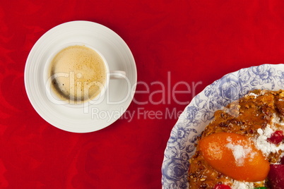 white cup of coffee  on red background