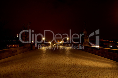 a beautiful night view of the Charles Bridge in Prague