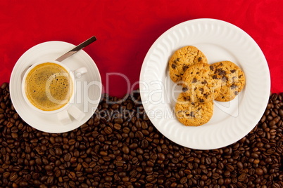 coffee cup from above with coffee beans