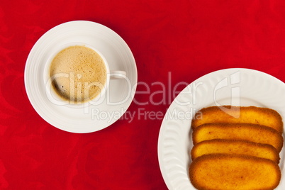 Coffee and cookies on a red background