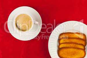 Coffee and cookies on a red background