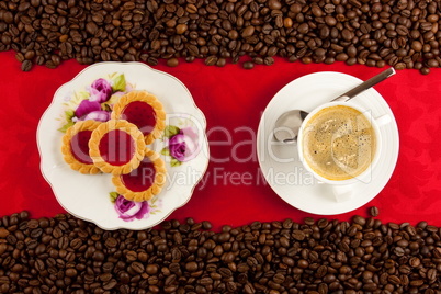 coffee cup from above with coffee beans
