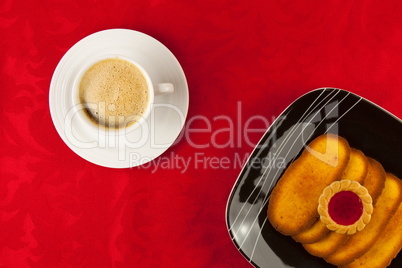 Coffee and cookies on a red background Coffee and cookies on a red background